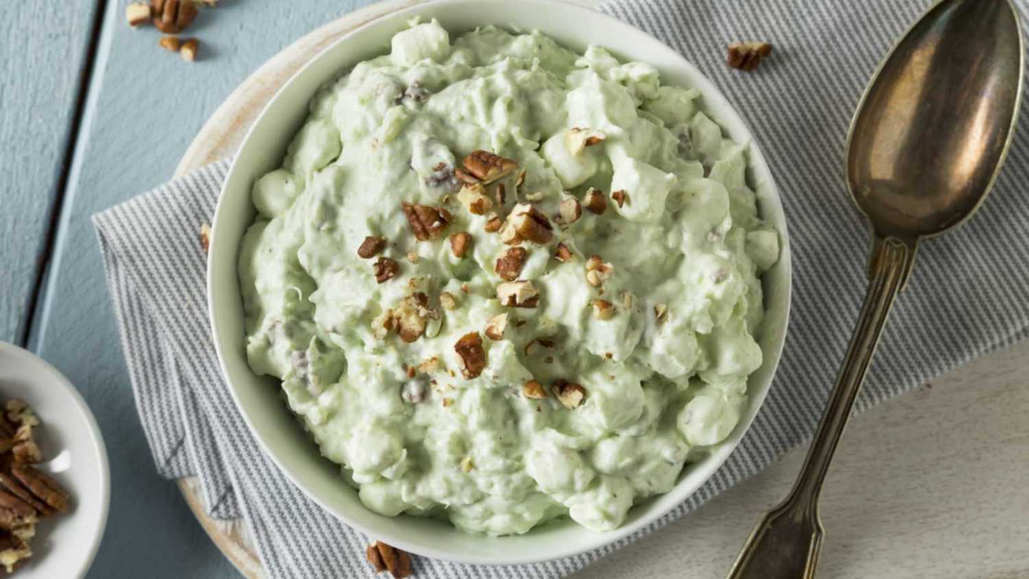 Homemade Green Pistachio Fluff Dessert with Pecans and Marshmallows