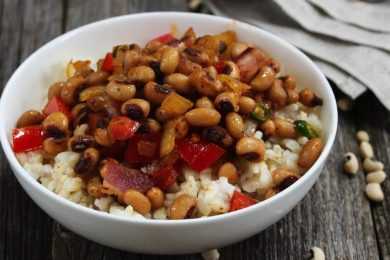 Homemade Southern Hoppin John or Carolina peas and rice served in a white bowl