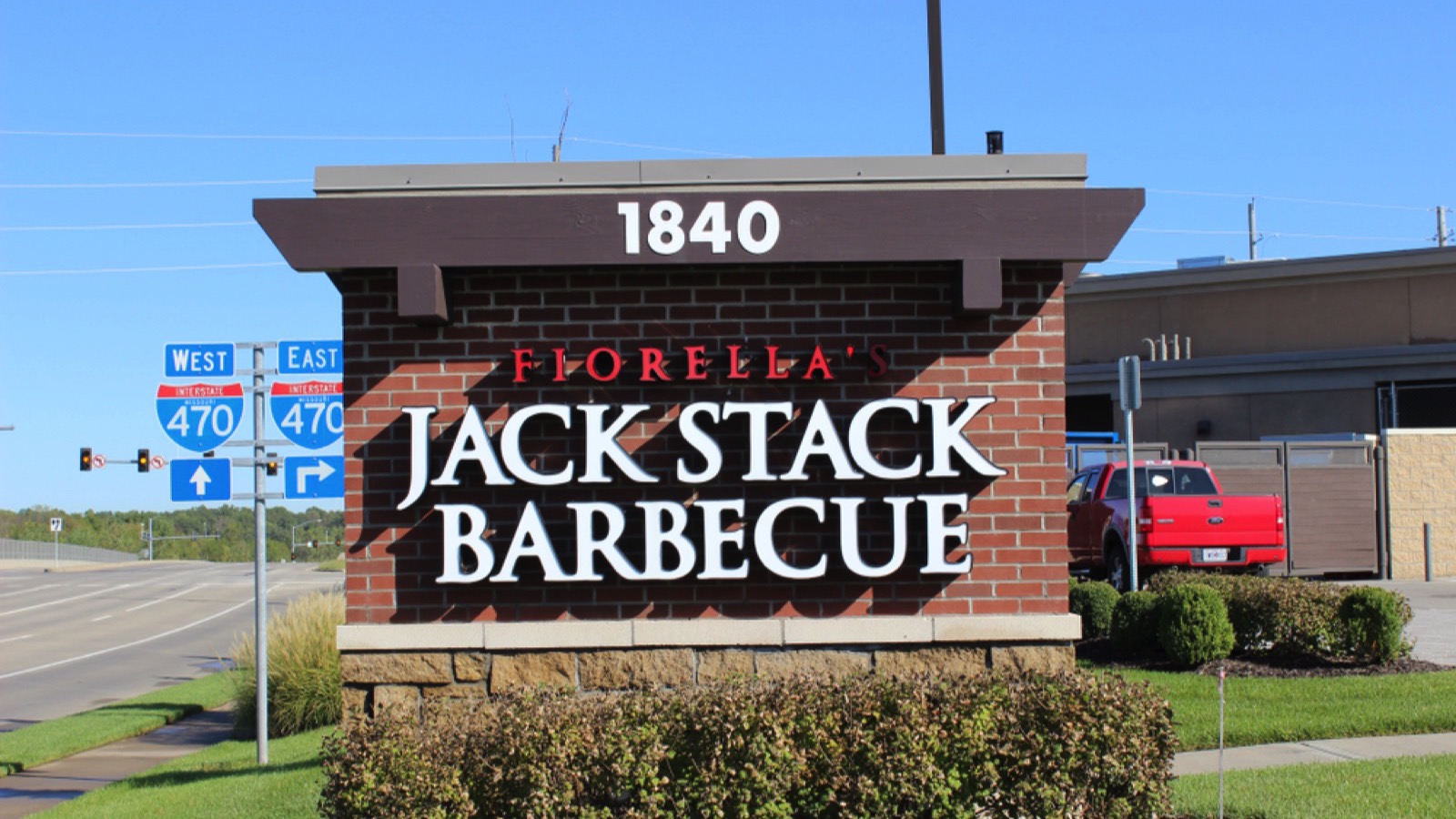 Lee's Summit, Missouri / USA - October 6 2019: Sign for FIORELLA'S JACK STACK BARBECUE beneath Blue Sky