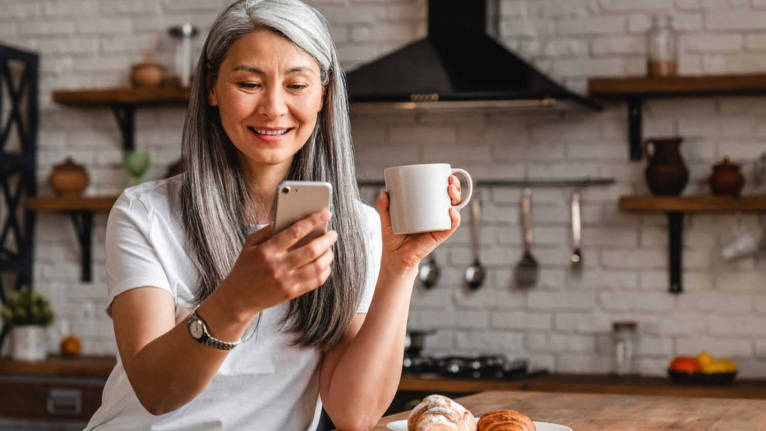 Middle aged woman using mobile