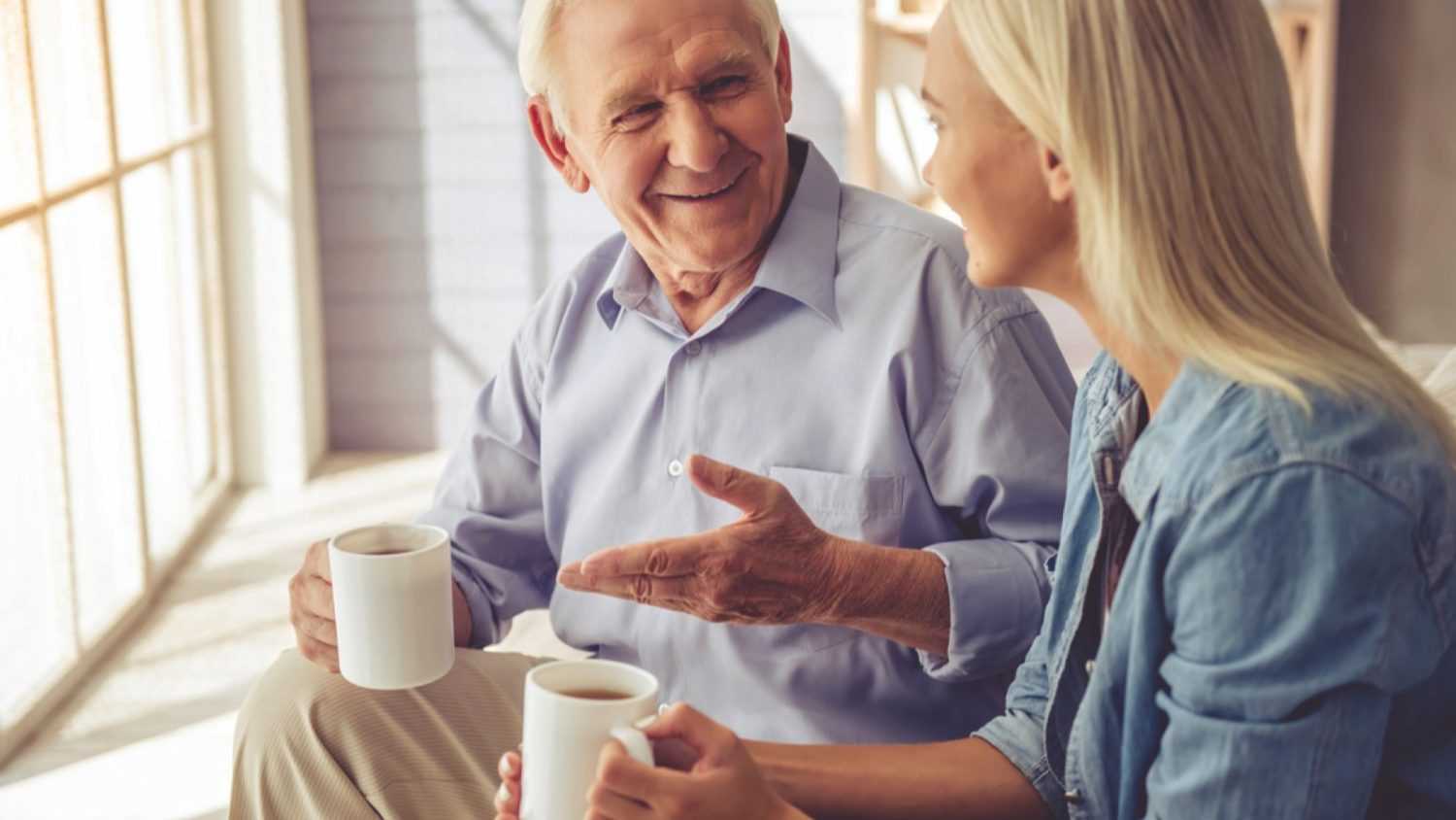 Old man chating with daughter